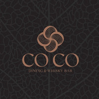 Logo cho 'COCO Dining & Whisky Bar' với thiết kế bánh xe xoáy màu đồng.